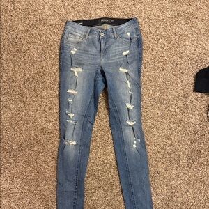 Trendy Distressed Skinny Jeans in Blue